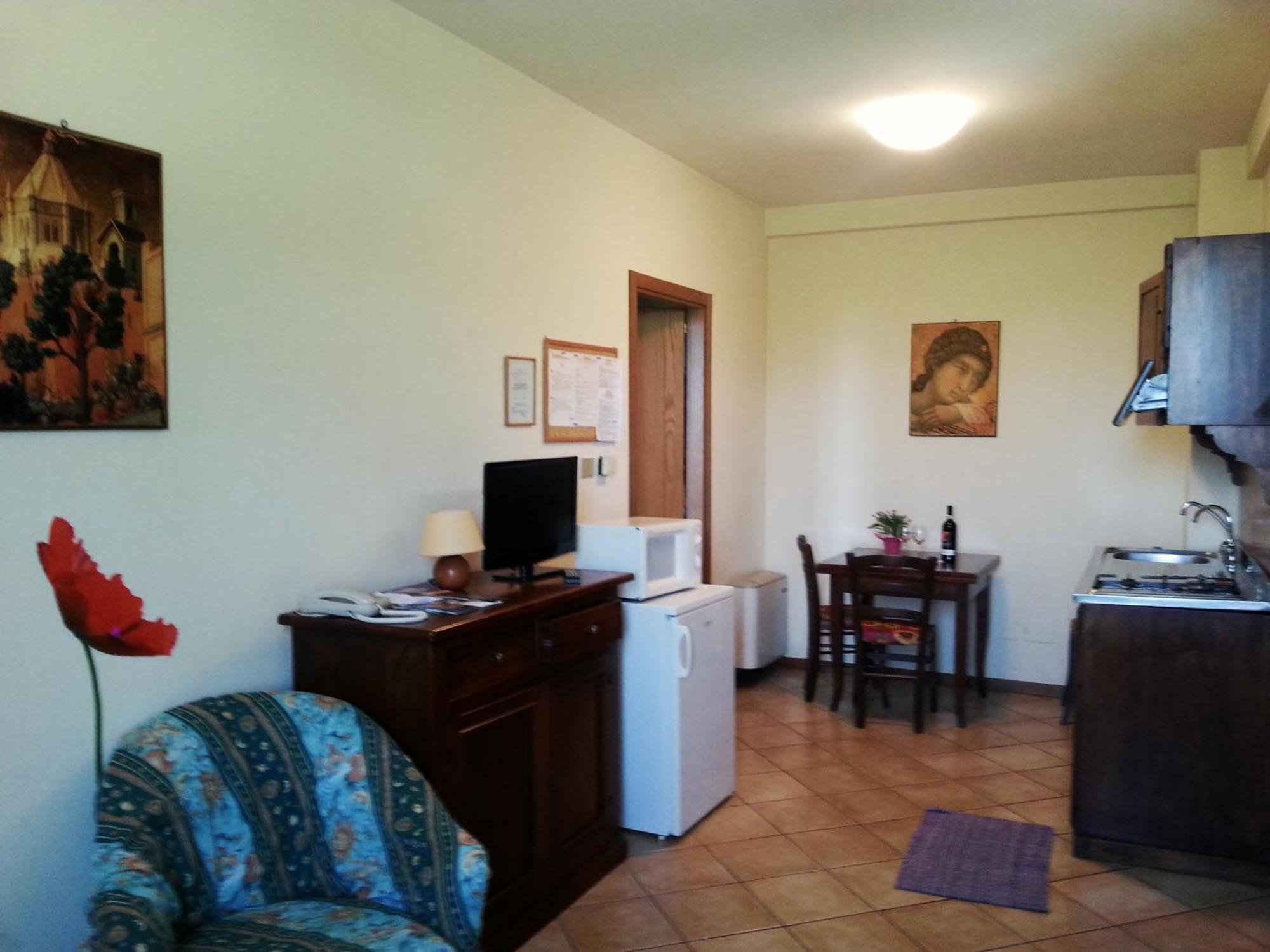 Residence Le Meridiane Siena Zimmer foto